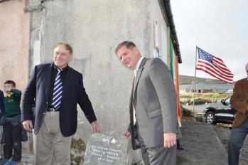 Boston Mayor Martin Walsh unveiled a stone marker at the site of a planned Emigrant Commemorative Centre in Carna, Co. Galway. Máirtín Ó Catháin, the chairperson of the group planning the centre, is at left. Bill Forry photo